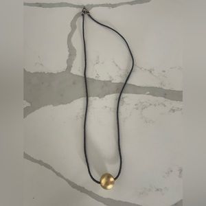 Necklace with gold color ball